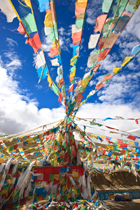 Prayer flags, Tibet by photographer Lewis Kemper
